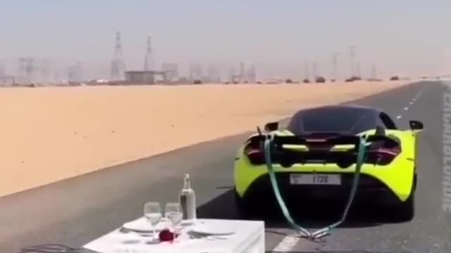 this car goes to prove cloth snatch from the table under the glass