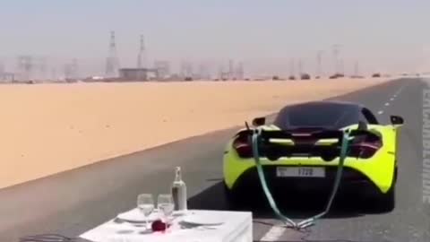 this car goes to prove cloth snatch from the table under the glass