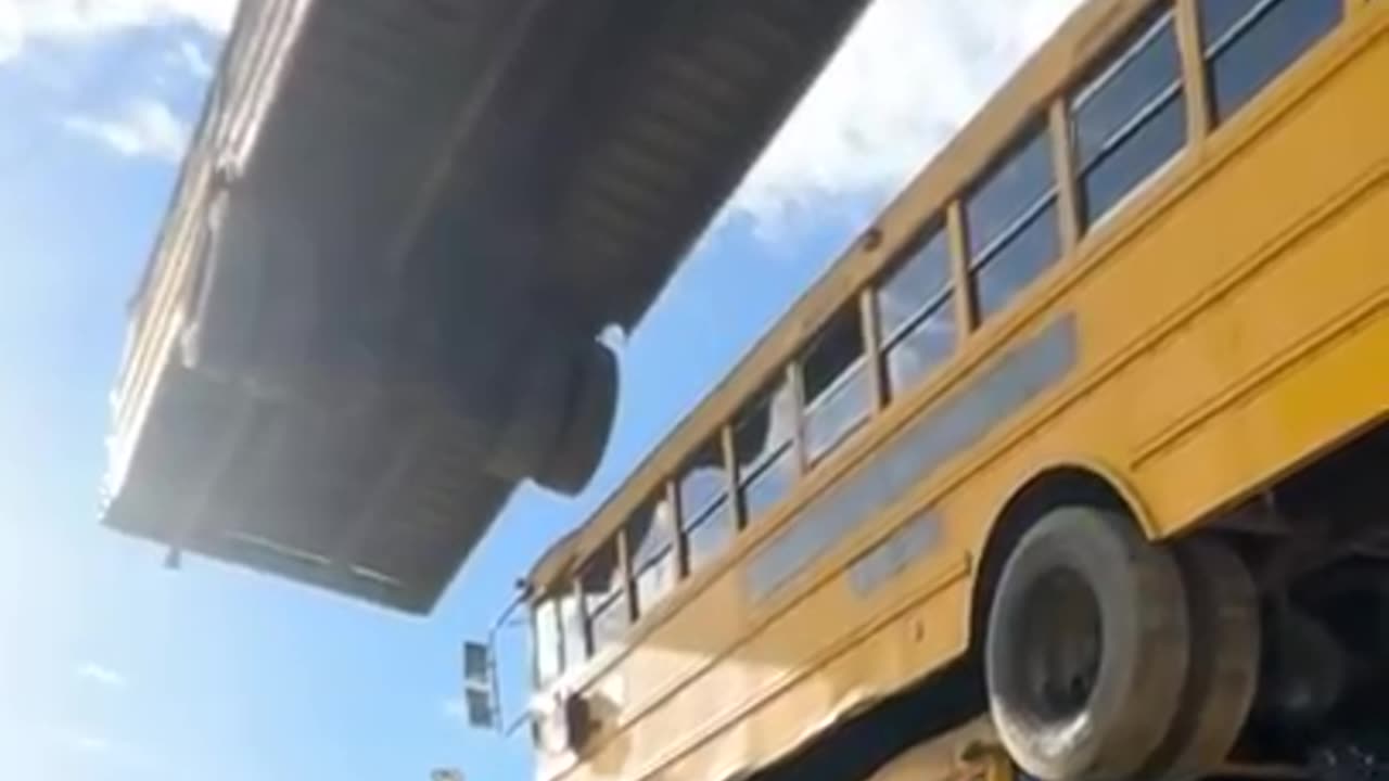 How Many School Buses Can We Stack?