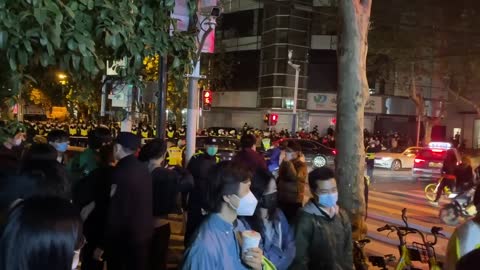 China_ Police stand guard at site of Shanghai protest _ AFP