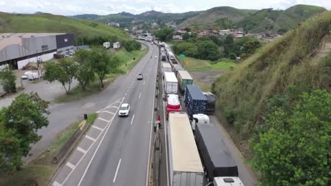 Truckers block highway after Bolsonaro defeat in Brazil election | AFP