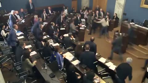 Chaos breaks out in the Georgian parliament.