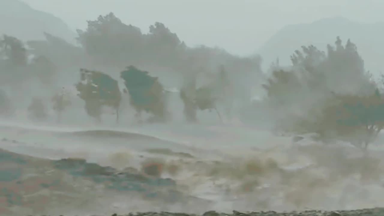 driving in desert while heavy rain and haistrom