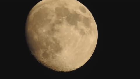 The Self-Luminescent Semi-Transparent Moon