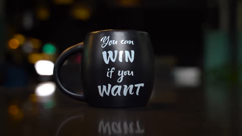 A Mug with Printed Motivational Quote