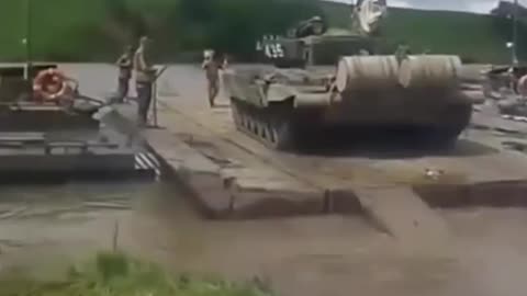 Russian Tank Flips Pontoon Bridge