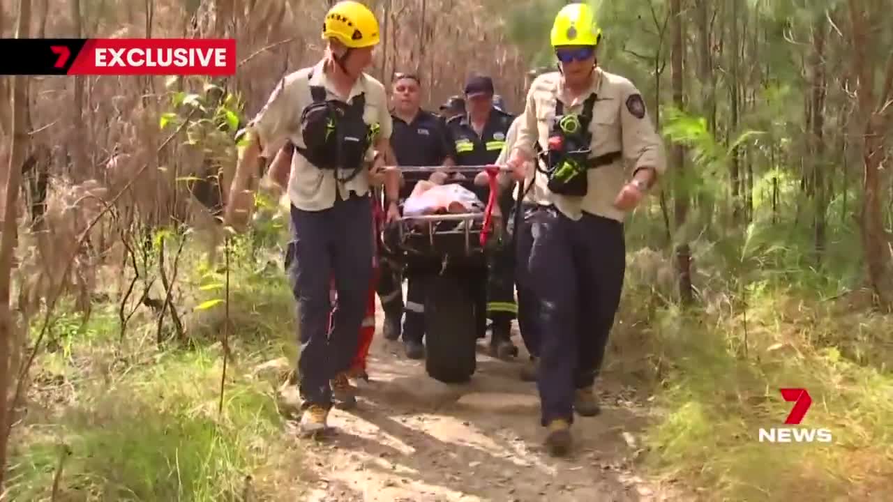 Emergency crews scale Mount Tibrogargan to rescue injured climber