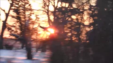 Driving Away From The Canadian Prairie Winter Sunset