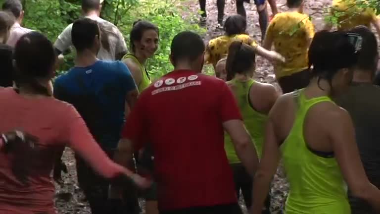 Thousands get down and dirty for Paris' 'Mud Days' obstacle course