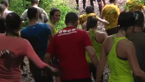 Thousands get down and dirty for Paris' 'Mud Days' obstacle course