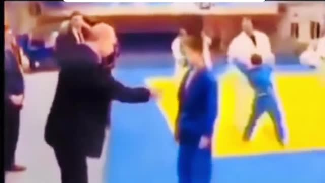 Putin teaches kid a karate move in seconds...