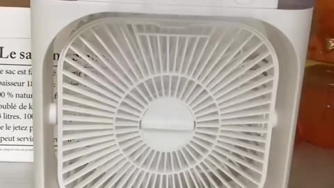 Mini portable air cooling fan