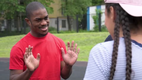 A guy greeting others