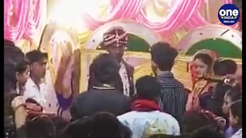 Bride slaps her groom on the stage and walks off