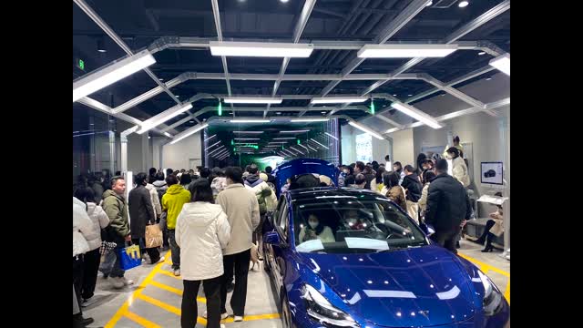 Protesters storm Tesla store in China after price cuts