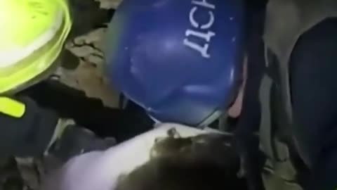 WATCH: Moment emergency workers rescue family from destroyed building in Ukraine