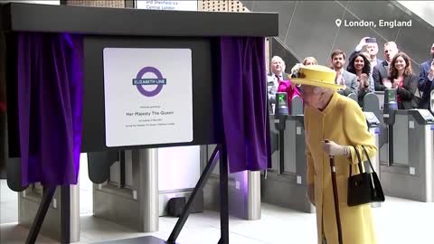 Britain's Queen Elizabeth opens train line named in her honor