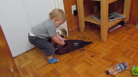 Baby Plays With Dustbuster, Freaks Out When It Turns