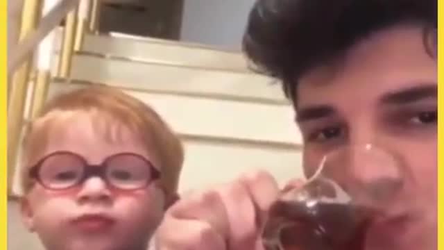 LIL KID KNOWS THE RIGHT WAY TO DRINK TEA