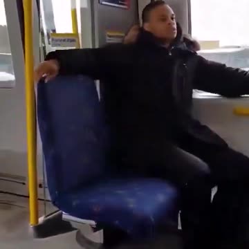 Young black man forces elderly white women to give up their seats.