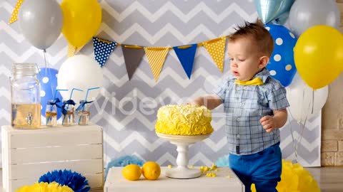 Hands in the birthday cake