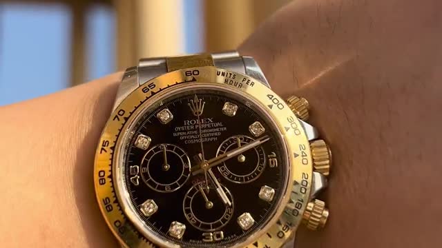 Rolex Daytona gold and black diamond engraved