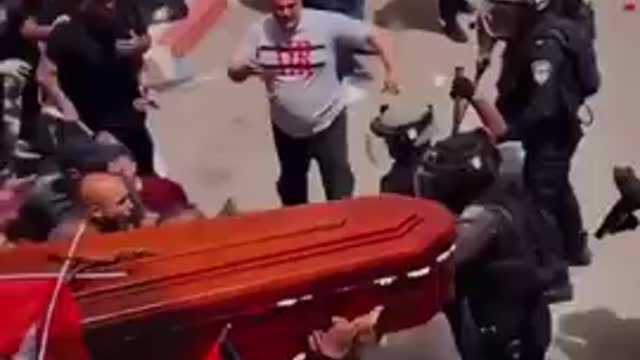 Israeli Police Attack Mourners at Palestinian Journalist’s Funeral