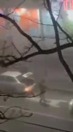 Armed Rioters in Kazakhstan Collect Weapons from Unmarked Vehicle and start Looting