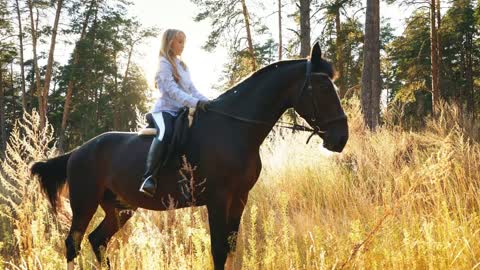 A Beautiful and natural young girl outdoors with horse