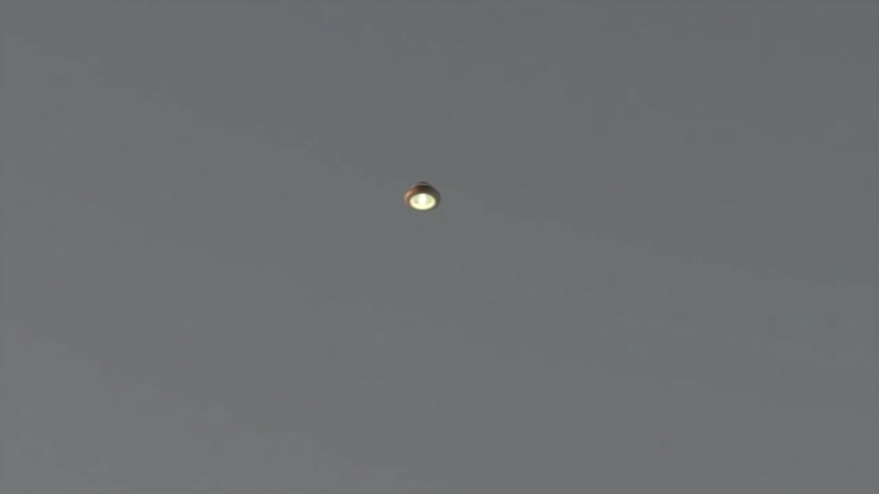 Bell-shaped object over Brisbane, Australia