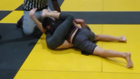 Girl wrestles boy