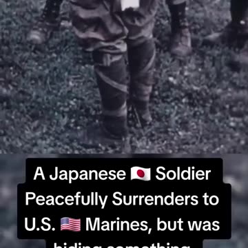 a japanese soldier peacefully surrenders to us marines but was hiding something