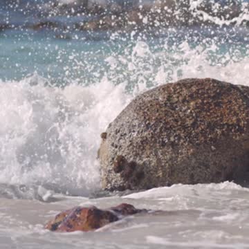 Waves Crashing on Boulders