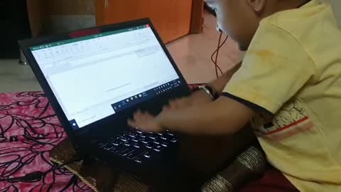 Baby Playing on Laptop