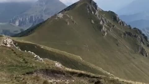 Mountains clouds nature