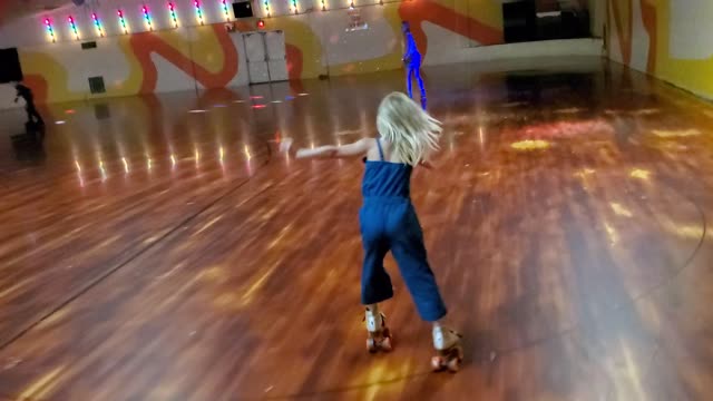 My little toothless munchkin rockin those skates.