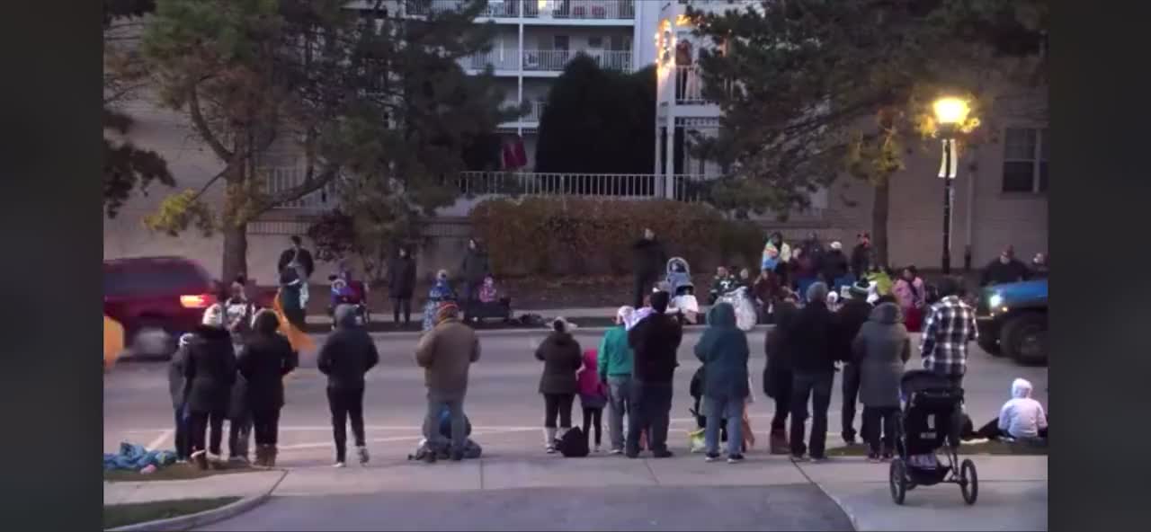 Car seen speeding past spectators into holiday parade in Waukesha, Wisconsin