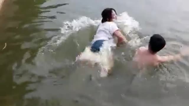 Couple competing in swimming