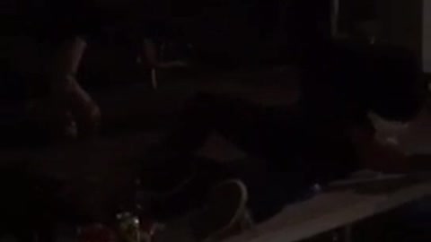 Music guy on roof jumps on friend