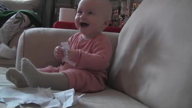 Baby Laughing hysterically at ripping paper