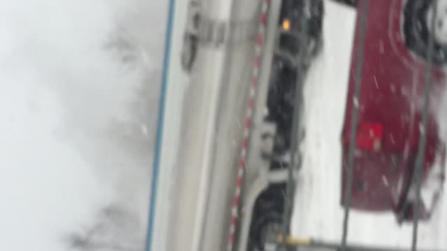 The 120 car pile-up that happened on I-94 this morning in Michigan in action.