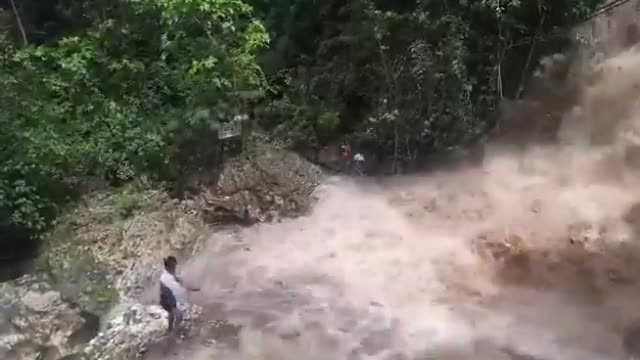 1 Dead (caught on cam), and some are missing when water on the river rises