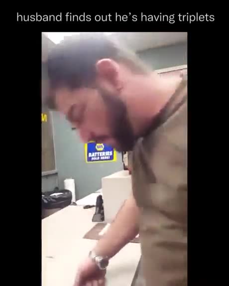 Does the man read and not understand, to be a baby drawn on a piece of paper?