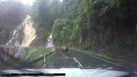 Raging Waterfalls Flood the Road