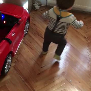 Cute baby getting dizzy performing the spin dance