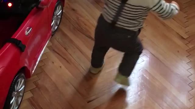 Cute baby getting dizzy performing the spin dance