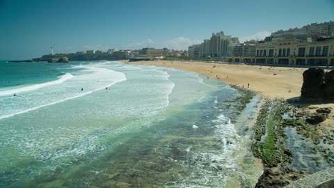 Ocean waves bursting on the shore of the coast