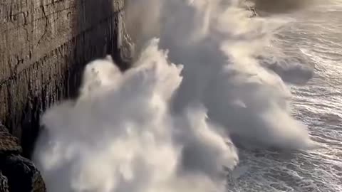 Waves against the cliffs of Inis Meain, Ireland.