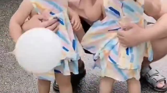 cute adorable triplets waiting for dad.this will melt your hearts.