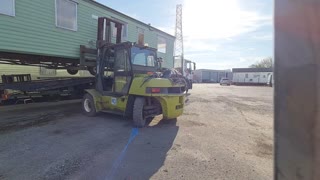 Static caravan being loaded with a forklift, carlisle